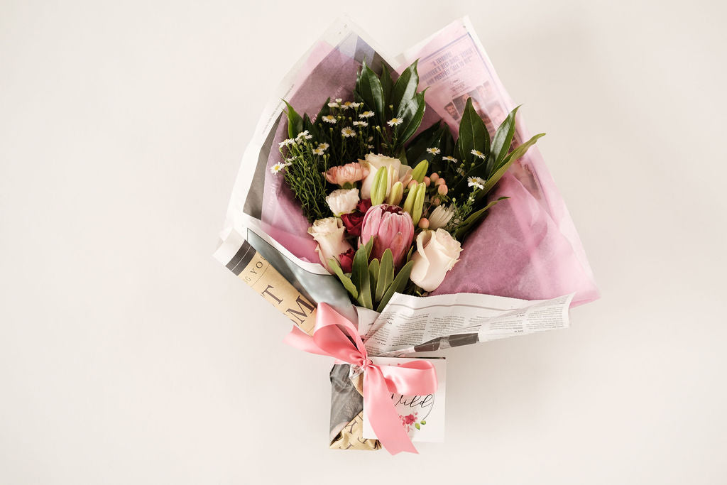 Flowers Designed in a Newspaper wrap