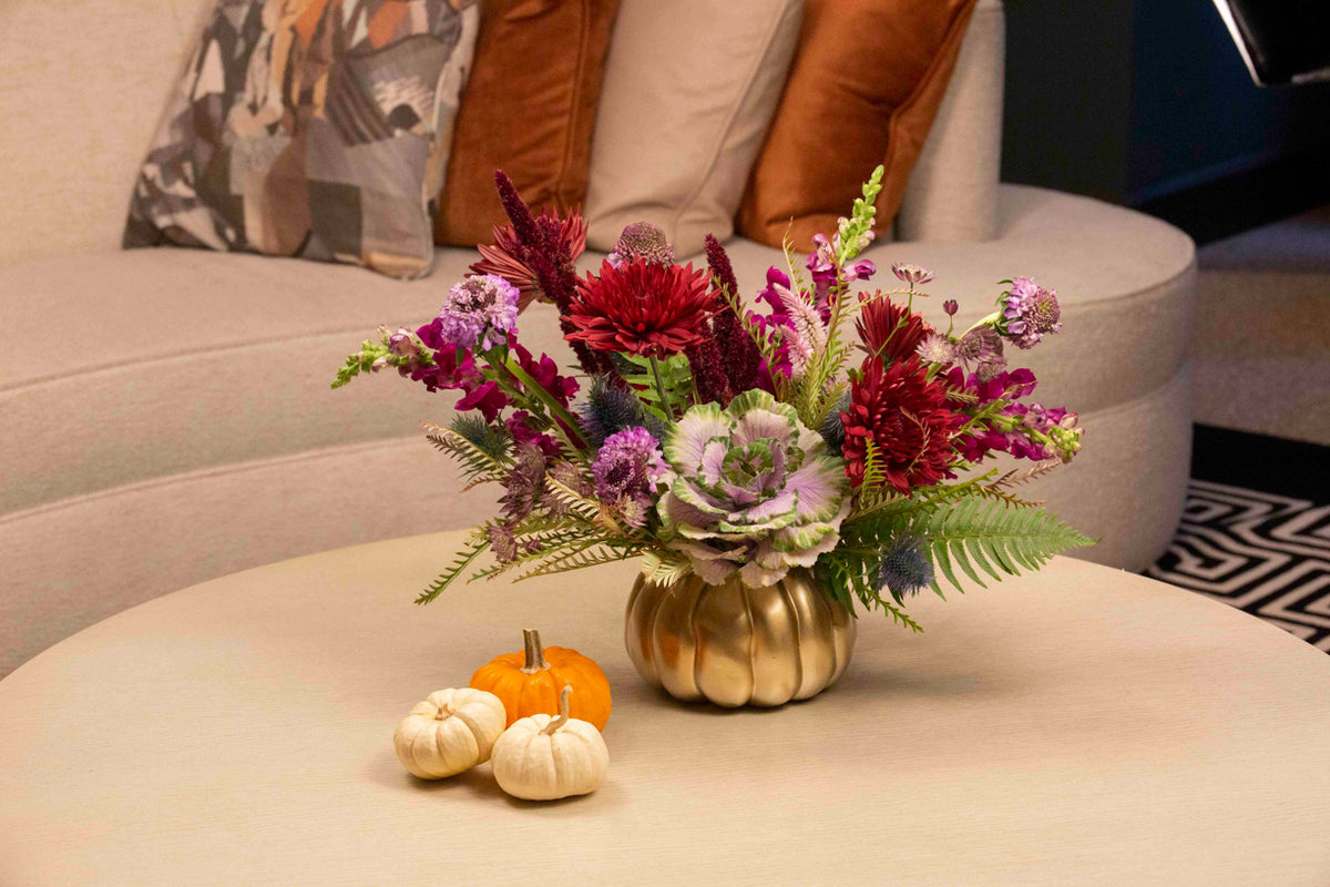 Kansas City Flower Delivery. Fall flowers in pumpkin vase with kale, cremons, amaranthus, snapdragons and blue thistle. Same day flower delivery for centerpieces and Thanksgiving flowers.