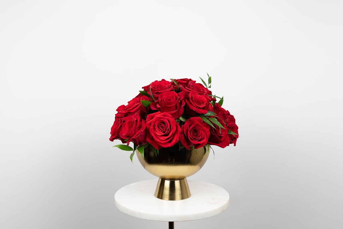 Red rose arrangement in gold compote. Red roses for Valentinne&#39;s Day. Delivery in local Kansas City Great Metropolitan Area. Same day delivery Valentine&#39;s Day arrangements. Glam arrangement.