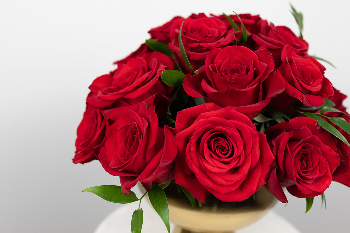 Red rose arrangement in gold compote. Red roses for Valentinne&#39;s Day. Delivery in local Kansas City Great Metropolitan Area. Same day delivery Valentine&#39;s Day arrangements. Glam arrangement.